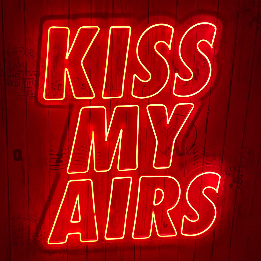 Kiss My Airs Neon Sign